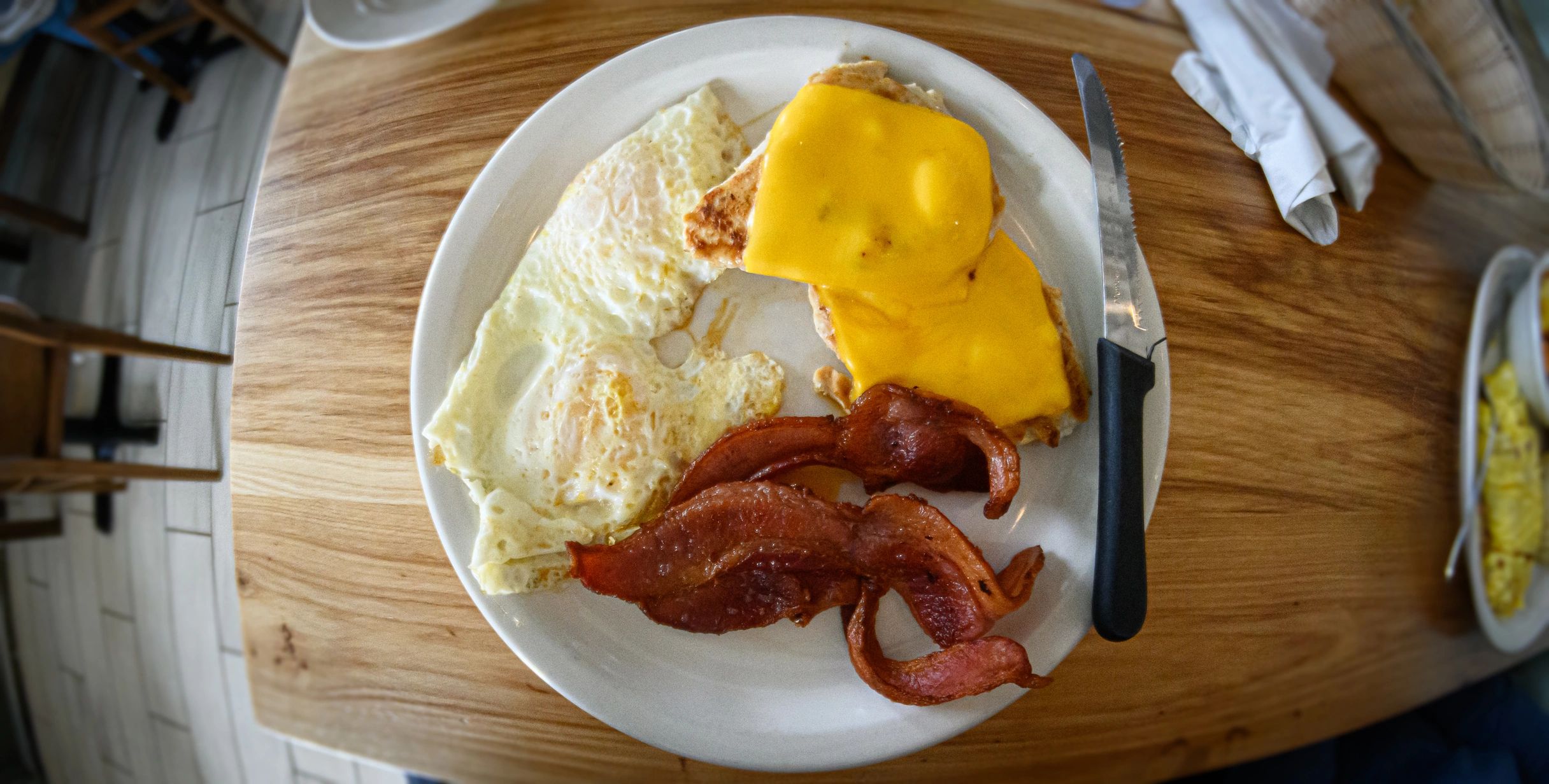 Complimentary hot buffet breakfast items on serving counter