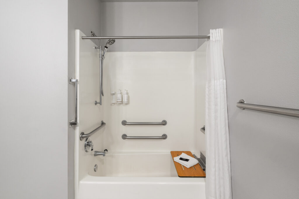 Guest room bathroom with roll-in shower